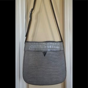 Grey Vince cross body leather purse. Interesting texture.